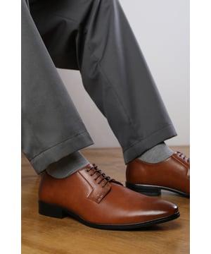 Elevate your formal style with these Elliot lace up derby formal dress work shoes. With a lace-up design, these shoes add a timeless appeal, perfect for any formal occasion. Step up your formal game with these elegant david Lace Up Derby Shoes, a perfect blend of style and comfort.Key Features:



Formal Design:   These shoes feature a sleek and classic design that adds sophistication to your outfit. The lace-up design adds a touch of visual interest, making these shoes stand out.

Comfortable Fit:   The shoes provides a comfortable and stable fit that is suitable for all-day wear. The lace up allows for an adjustable and secure fit, ensuring that these shoes stay comfortably on your feet.

Durable Construction:   Crafted with high-quality materials, these shoes are built to last. The sturdy construction ensures durability and longevity, making them a reliable choice for regular wear.

Suitable for Any Occasion:   perfect for formal occasions   or simply want to elevate your everyday look, these shoes are suitable for any occasion. Their formal design and comfortable fit make them a versatile choice for all-day wear.


     Specification:-  Pattern: Solid  Upper Material: PU  Occasion: Formal  Product Type: Derby Shoes  Shoe Type: Lace-Up

 Invest in our David lace up derby formal dress work shoes and experience the perfect blend of style, comfort, and durability. Pair it with earthy tones like beige, grey, or brown chinos, or opt for a more dressy pants variant, and step out with confidence.  