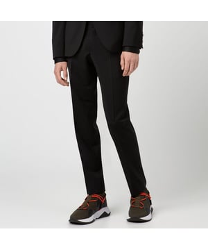 Men's Hugo Griffin181S Trousers. The Boss trousers, part of the formal collection, are crafted for a sophisticated appearance. Featuring a zip-fly and a button closure, it exudes elegance.- Slim fit.- Zip-fly.- Side pockets.- Belt loops at waistband. Material: 100% Virgin Wool. Ref: 50379578001.