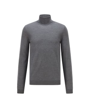 Men's BOSS Musso-P Sweater. A refined turtleneck sweater by BOSS Menswear, crafted in extra-fine Italian merino wool for super-soft comfort. Cut to a slim fit with long sleeves and ribbed cuffs, this minimalist design offers a premium feel and is finished with a subtle BOSS badge at the hem. Layer this understated sweater under a sports jacket or team it with jeans for a laid-back look. 100% Virgin Wool. Machine washable. Ref: 50392083030.