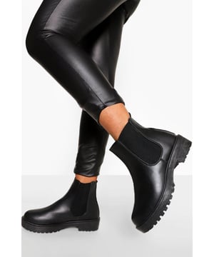 Chunky Chelsea boot design with elastic side panels
        Robust, textured outsole for enhanced grip
        Pull tab at the back for easy on-and-off
        Flat heel between 0 and 2cm for all-day comfort
        Versatile ankle-high silhouette
    
    Step out in style with these edgy chunky Chelsea boots, perfect for the fashion-forward trendsetter. The classic Chelsea boot silhouette gets a modern update with a bold, chunky sole that adds attitude to any outfit. Ideal for casual outings, these boots pair effortlessly with skinny jeans and an oversized jumper for a relaxed weekend look. The flat heel ensures comfort for long walks through the city or impromptu shopping trips with friends. For a more daring ensemble, team them with a flowy midi dress and leather jacket to create a striking contrast between soft and tough elements. Whether you're heading to a casual family gathering or meeting mates at the local pub, these versatile boots will keep you looking on-trend and feeling comfortable all day long.
