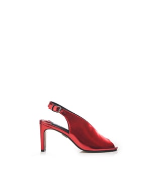 Arrive in style with Christiie, the sling back peep toe shoe with added embellishments. This heel features a buckle fastening for a secure fastening whilst the padded sock and leather lining ensure a comfortable wear. Matching clutch bag available.