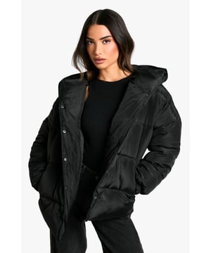 Cosy hooded design for extra warmth and style
        Padded construction offers superior insulation
        Oversized fit for a trendy, relaxed silhouette
        Front button closure for easy wear
        Versatile petite sizing for a perfect fit
    
    Embrace the chill with this must-have Petite Hooded Padded Coat from Boohoo. This versatile piece combines comfort and style, making it perfect for your casual outings. The oversized silhouette allows for effortless layering, while the padded construction ensures you stay snug in cooler temperatures. Style it with wide-leg trousers and trainers for a laid-back look, or pair it with skinny jeans and ankle boots for a more polished ensemble. Whether you're heading to a family gathering or meeting friends for a coffee, this coat will keep you looking fashionable and feeling cosy. Its adaptable nature makes it an ideal choice for various casual occasions, from weekend errands to relaxed evening walks. The petite sizing ensures a flattering fit for smaller frames, proving that fashion-forward outerwear isn't just for the tall.
