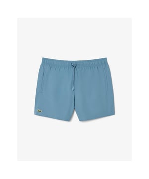 Step out of the water almost dry with these recycled quick-dry recycled polyester taffeta swim shorts. Loaded with practical features including two side pockets, mesh lining and a contrast drawstring. Your weekend getaway just got more exciting.
Light recycled quick-dry taffeta (smooth, very light weaved fabric with a slightly shiny finish)Side pocketsElasticised waistband with contrast drawstringMesh liningEmbroidered green crocodile on thighPolyester (100%)
MH6270