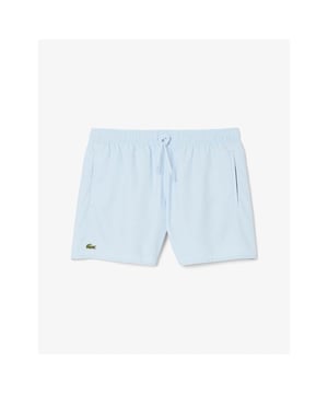 Step out of the water almost dry with these recycled quick-dry recycled polyester taffeta swim shorts. Loaded with practical features including two side pockets, mesh lining and a contrast drawstring. Your weekend getaway just got more exciting.
Light recycled quick-dry taffeta (smooth, very light weaved fabric with a slightly shiny finish)Side pocketsElasticised waistband with contrast drawstringMesh liningEmbroidered green crocodile on thighPolyester (100%)
MH6270