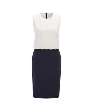 Round neck.Back zip fastening.Sleevelss.