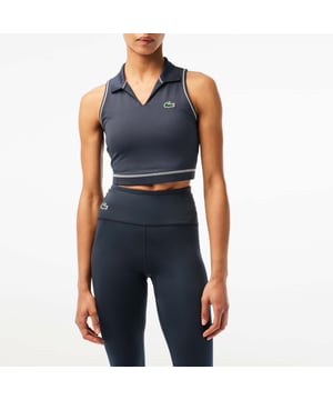 Women's Lacoste Sport Polo Style Sports Bra.- Tight, close-fitting cut: Perfect for any sport.- Ribbed collar: A classic Lacoste finish detail.- Interlock fabric: Hard-wearing and absorbent.- Silicone crocodile badge: Iconic. Material: 85% Polyester, 15% Elastane. Ref: IF4913KXE.