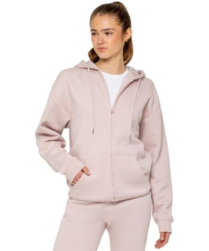 The Enzo Women's Zipped Hoodie boasts an oversized fit with a convenient zip-up design and adjustable drawstring hoodie. The cuffed wrists and brushed back inner fleece ensure maximum comfort, making it the perfect choice for casual wea