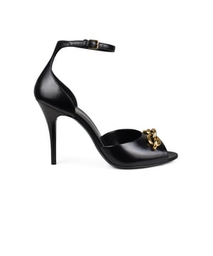 Sandalias negras Le Maillon Saint Laurent.De cuero.Enlaces de oro en la parte delantera.Correa de tobillo con cierre de hebilla.Tacón negro.Made in Italy.