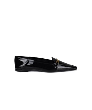 Mocasines Chris en charol negro Saint Laurent.Bailarinas adornadas con un horsebit dorado.Puntera en punta.Tacón de 0,5 cm.100% piel de becerro.Made in Italy.