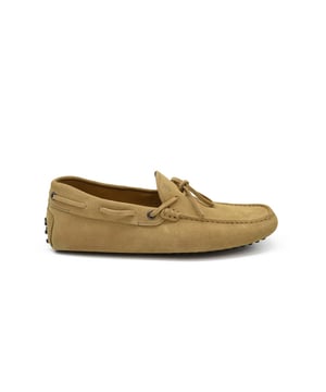 Mocasines Tod's en ante beige.Cordones atados al frente.Suela de goma con tachuelas.Made in Italy.