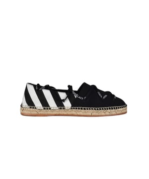 Alpargatas Off-White en lona negra.Logotipo impreso en blanco en la mitad de la zapatilla.Suela de cuerda natural beige.Lazos de la marca  ShoesLaces .Puntera redondeada.