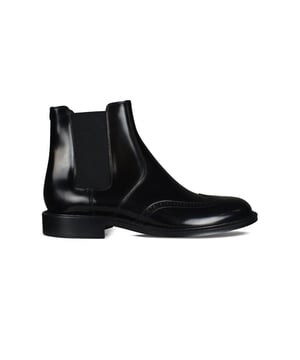 Botas Chelsea Saint Laurent, modelo Army en cuero negro liso.Botas con punta redonda y perforaciones Richelieus en la parte delantera.Inserciones laterales elásticas en los laterales.Talón acanalado.Lengüeta de Grosgrain en la parte trasera.Altura del tacón: 2 cm.Suela de cuero.100% piel de becerro.Made in Italy.