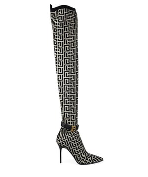 Balmain steltlopers model Raven in mesh met monogram.Tweekleurig zwart en grijs model. Pitte neus en zwart gelakte hak.Afneembare zwarte leren band bij de enkel met gouden logo.Hakhoogte 9,5 cm.Instappers.Made in Italy.