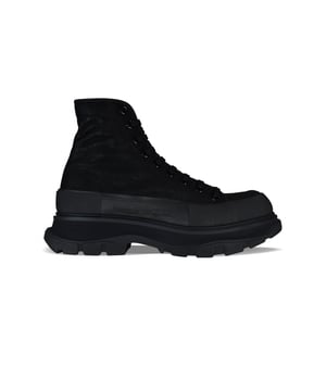 Sneakers altas Alexander McQueen Tread Slick.Malla negra.Puntera redonda con inserción de goma.Logotipo en el talón y la lengüeta.Cierre de cordón plano negro.Suela de goma negra sobredimensionada de la firma.Made in Italy.