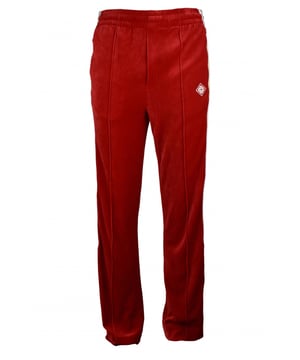 Pantalón de chándal Laurel de terciopelo de algodón rojo Casablanca.Raya de satén de punto de laurel emblemática en los laterales.Parche con logotipo bordado.Cintura elástica. Bolsillos laterales con cremallera.Bolsillo trasero.