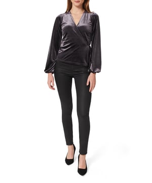 Embrace elegance with the Livvy Wrap Top, crafted from luxurious velvet, featuring a flattering V-neck and tie waist for a stunning silhouette. Perfect for both casual and sophisticated looks.