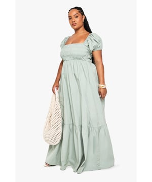 Flowing cotton poplin maxi dress with dramatic tiered hem for added movement
        Elegant square neckline complemented by charming puff sleeves
        Elasticated bodice creates a flattering silhouette whilst ensuring comfort
        Floor-sweeping length offers a graceful, feminine aesthetic
        Versatile design perfect for styling across multiple seasons
    
    This breezy cotton maxi dress from Boohoo combines comfort with effortless style for your casual wardrobe. The elasticated bodice creates a flattering fit whilst the square neckline frames your dcolletage beautifully. Style as seen with a woven tote bag and minimal accessories for relaxed daytime events, or dress up with statement jewellery and strappy sandals for garden parties and family gatherings. The tiered skirt creates beautiful movement as you walk, whilst the breathable cotton fabric ensures you stay comfortable throughout the day. Perfect for warm-weather holidays, weekend brunches or casual meetups, this dress offers versatility without compromising on style. Layer with a denim jacket and trainers for a more casual approach when temperatures cool.