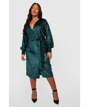 This plus size wrap dress is about to become your new go-to. With a wrap-around design that cinches you in at the waist and creates a soft V neckline, there's no denying a plus wrap dress deserves a place in your dresses collection. Whether you're loving floral styles, understated black or statement red for date night, it's time to show off your figure in this flattering dress.Style: Wrap DressFabric: SequinLength: MidiSleeve Length: Long Sleeve