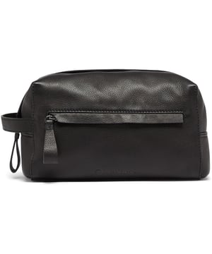 Travel in style with the Oliver Sweeney Hartwell washbag. This black leather toiletries bag makes a sharp statement whether on a short break or a weekend away. The water-resistant lining, elasticated internal pockets, zip closure and external zip pocket add to the practicality. This bag complements your make-up and shower essentials.