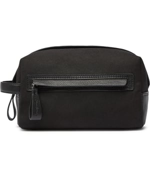 Travel in style with the Oliver Sweeney Hartwell washbag. This black leather toiletries bag makes a sharp statement whether on a short break or a weekend away. The water-resistant lining, elasticated internal pockets, zip closure and external zip pocket add to the practicality. This bag complements your make-up and shower essentials.