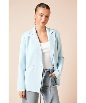 Tailored blazer featuring elegant seam front detailing for a refined silhouette
        Classic notched lapel collar with double-breasted button fastening
        Sophisticated back pleat detail adds movement and structure
        Long sleeves with clean-lined finish for a contemporary look
        Versatile woven fabric that maintains its shape throughout the day
    
    This Dorothy Perkins blazer combines timeless tailoring with modern detailing, making it the perfect centrepiece for your occasion wardrobe. The structured seam detailing creates a flattering shape that works beautifully for formal events whilst remaining versatile enough for everyday styling. Pair with wide-leg trousers and a simple camisole as shown for an effortlessly chic brunch ensemble, or dress up with a midi skirt and court shoes for weddings and race days. The clean lines and considered cut make this blazer ideal for those moments when you need to look polished without appearing overdressed. A true wardrobe hero that transitions seamlessly from office meetings to evening celebrations, offering the perfect balance of sophistication and contemporary style for the fashion-conscious woman.