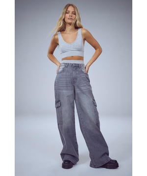 Wide leg silhouette for a relaxed, on-trend look
        Cargo-style pockets add functionality and street-style edge
        High-rise waist for a flattering fit
        Denim construction offers durability and versatility
        Belt loops allow for customisation with your favourite accessories
    
    Make a bold statement with these wide leg cargo jeans from Boohoo. Perfect for the fashion-forward woman who values both style and comfort, these jeans combine the relaxed fit of wide-leg trousers with the edgy appeal of cargo pockets. The high-rise waist creates a sleek silhouette, while the roomy leg allows for effortless movement. Style these versatile jeans with a cropped top and trainers for a casual daytime look, or dress them up with a fitted bodysuit and heels for an evening out. The cargo pockets not only add a trendy touch but also provide practical storage for your essentials. Whether you're heading to a family gathering or meeting friends for a coffee, these jeans offer the perfect blend of comfort and style for various casual occasions.