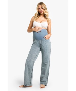 Relaxed boyfriend-style fit for ultimate comfort
        High-waisted design with stretchy over-bump panel
        Classic five-pocket styling
        Versatile light wash denim
        Full-length legs with a straight cut
    
    Embrace laid-back chic with these maternity boyfriend jeans from Boohoo. Perfect for the fashion-forward mum-to-be, these jeans offer a relaxed fit that doesn't compromise on style. The high-waisted design features a stretchy over-bump panel for growing comfort, while the classic five-pocket styling maintains a timeless look. Pair with a fitted white top and trainers for a casual daytime ensemble, or dress them up with a flowing blouse and ankle boots for evening drinks with friends. The versatile light wash denim makes these jeans a wardrobe staple that can effortlessly transition from day to night. Whether you're running errands or meeting for brunch, these jeans provide the perfect blend of comfort and style to accommodate your changing body throughout pregnancy.