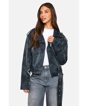 Vintage-inspired biker jacket with a distressed finish
        Asymmetrical zip front for edgy appeal
        Notched lapels and epaulettes for classic biker style
        Multiple zipped pockets for practicality and style
        Adjustable belt at hem for a customisable fit
    
    Channel your inner rebel with this vintage-inspired biker jacket from Boohoo. The distressed finish gives it a lived-in look that's perfect for adding edge to any outfit. Pair it with wide-leg jeans and a simple white tee for an effortlessly cool daytime look, or throw it over a floral dress to add some attitude to your evening ensemble. The versatile design makes it suitable for various casual occasions, from coffee dates to gigs. The multiple zipped pockets are not only stylish but practical for keeping your essentials close at hand. Whether you're heading to a family gathering or a night out with friends, this jacket will be your go-to for an instant style upgrade. Remember to keep your footwear casual - think trainers or ankle boots - to maintain the relaxed vibe this jacket embodies.