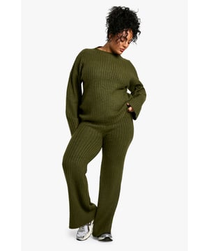 Cosy ribbed texture for added comfort and style
        Oversized fit for a relaxed and trendy silhouette
        Crew neckline for a classic touch
        Wide-leg trousers for a fashionable and flattering look
        Coordinated set for effortless outfit planning
    
    Embrace laid-back luxury with this plus-size ribbed co-ord set from Boohoo. The oversized roundneck jumper paired with wide-leg trousers creates a chic and comfortable ensemble perfect for various casual occasions. Style this versatile set with trainers for a day of errands or dress it up with ankle boots for a cosy night in with friends. The ribbed texture adds a touch of sophistication, while the relaxed fit ensures all-day comfort. Ideal for family gatherings or lazy weekends, this co-ord set allows you to look effortlessly put-together with minimal fuss. For a trendy twist, layer with a longline coat and add statement jewellery to elevate your look from day to night.