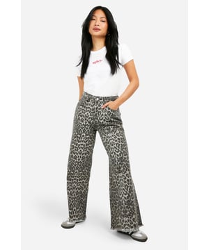 Eye-catching leopard print denim jeans
        Straight leg silhouette for a classic look
        High-rise waist for a flattering fit
        Functional front and back pockets
        Wide leg opening for a trendy, relaxed style
    
    Make a bold statement with these striking leopard print straight leg jeans from Boohoo. Perfect for the fashion-forward woman who loves to stand out, these jeans offer a unique twist on a wardrobe staple. The high-rise waist creates a sleek silhouette, while the straight leg cut provides comfort and versatility. Style these eye-catching trousers with a simple white tee and trainers for a casual daytime look, or dress them up with a black bodysuit and heels for a night out with friends. The wide leg opening adds a contemporary touch, making these jeans ideal for various casual occasions, from family gatherings to weekend brunches. Embrace your wild side and let your personality shine through with these daring yet wearable leopard print jeans.