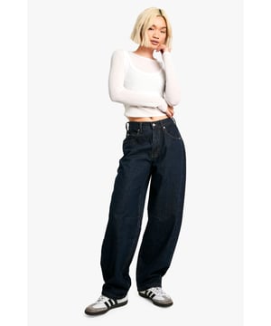 Tapered fit for a modern silhouette
        Distinctive seam detailing adds visual interest
        High-rise waist for a flattering fit
        Rigid denim construction for a structured look
        Wide leg design for a relaxed, on-trend appearance
    
    Make a bold statement with these eye-catching tapered jeans from Boohoo. The unique seam detailing sets these trousers apart, offering a contemporary twist on a classic style. The high-rise waist and wide leg design create a striking silhouette that's both comfortable and fashion-forward. Perfect for casual outings, these jeans can be effortlessly styled for various occasions. Pair them with a cropped top and trainers for a laid-back daytime look, or dress them up with a fitted blouse and heeled boots for an evening out. The rigid denim ensures these jeans maintain their shape throughout the day, making them a versatile addition to your wardrobe. Whether you're heading to a family gathering or meeting friends for coffee, these jeans offer the perfect blend of style and comfort for the fashion-conscious woman.