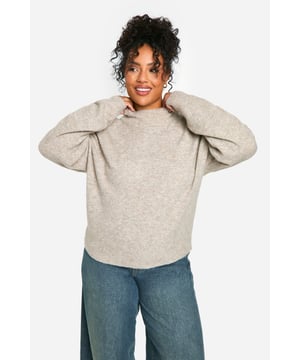 Soft, cosy high neck design for ultimate comfort
        Relaxed fit with dropped shoulders for effortless style
        Ribbed cuffs and hem for a snug, secure fit
        Versatile neutral tone suitable for various outfits
        Plus size friendly, ensuring a flattering fit for all body types
    
    Embrace laid-back luxury with this plus-size high neck jumper from Boohoo. Perfect for those chilly days when you want to feel wrapped in warmth without compromising on style. The relaxed silhouette with its dropped shoulders offers a contemporary edge, while the soft fabric ensures all-day comfort. Pair it with wide-leg jeans and trainers for a casual weekend look, or dress it up with a midi skirt and ankle boots for a cosy yet chic ensemble. This jumper is ideal for family gatherings, coffee dates with friends, or simply lounging at home. Its versatility makes it a wardrobe staple that you'll reach for time and time again. The ribbed detailing at the cuffs and hem adds a touch of refinement, ensuring the jumper maintains its shape wear after wear. Whether you're running errands or meeting friends for a casual lunch, this high neck jumper is your go-to for effortless style and comfort.