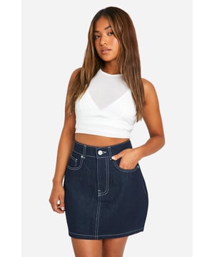 Mini skirt design for a flirty, youthful look
        High-waisted silhouette to accentuate curves
        Contrast stitching for added visual interest
        Functional front and back pockets for practicality
        Versatile cotton fabric for comfort and durability
    
    Make a bold statement with this petite denim mini skirt, perfect for the fashion-forward trendsetter. The high-waisted design flatters your figure, while the mini length shows off your legs for a confident, head-turning look. Pair it with a cropped white top and chunky trainers for a casual daytime ensemble, or dress it up with a sleek bodysuit and strappy heels for a night out on the town. The versatile denim fabric ensures this skirt can take you from brunch with the girls to dancing at the hottest club. Add a leather jacket and some statement jewellery to really amp up the edgy vibe. Whether you're meeting friends for drinks or hitting the urban nightlife scene, this skirt is your go-to piece for effortless style that commands attention.