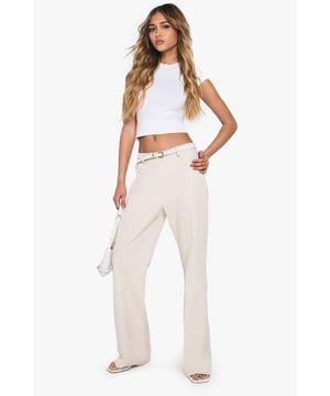 Flared leg design for a retro-inspired silhouette
        High-waisted fit for a flattering and elongating effect
        Smooth, stretchy fabric for all-day comfort
        Belt loops for optional accessorising
        Versatile style suitable for various casual occasions
    
    Make a statement with these eye-catching flared trousers from Boohoo. Perfect for the fashion-forward woman who loves to embrace trends, these trousers offer a nod to 70s style while remaining thoroughly modern. The high-waisted design elongates your silhouette, while the flared leg adds drama to your look. Pair with a cropped top as shown for a balanced silhouette, or try with a fitted bodysuit for a sleek evening ensemble. The stretchy fabric ensures comfort for all-day wear, whether you're heading to a casual lunch or a night out with friends. Dress them up with heeled sandals and statement jewellery, or keep it casual with trainers and a denim jacket. These versatile trousers are a must-have addition to any fashion-lover's wardrobe, offering endless styling possibilities for the season ahead.