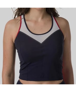 Main Fabric: 72% Polyamide 28% Elastane
Insert: 69% Polyamide 31% Elastane. Made from aÂ stretchyÂ polyamide and ethyleneÂ fabric, this top has aÂ short tank top styleÂ that can be worn alone. It'sÂ versatileÂ in that it can be worn in the yoga studio or the gym, as long as the activity isn't too intense since it offers aÂ low-intensity fit