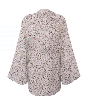 Main: 100% Polyester. The Pretty Lavish balloon sleeve satin mini dress in a spring floral pattern captures the essence of the season with its vibrant and airy design. Its luxurious satin fabric glides effortlessly, reflecting the warm glow of the sun, while the balloon sleeves add a touch of whimsy and elegance. Perfect for garden parties or sunny strolls, this dress is a celebration of the freshness and joy that come with summer days. It's a piece that promises to turn heads and uplift spirits with its delightful fusion of comfort and chic style.