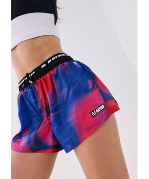 100% polyester. Designed for running and your high-performance cardio sessions, the Rewind Short by P.E Nation is a bright and bold addition to your workout wardrobe. It features an internal brief with a P.E branded hip band and adjustable tie for a comfortable all day fit.