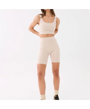 90% ORGANIC COTTON &amp; 10% ELASTANE. High waisted 7" length shorts. Built-in waistband support. P.E Nation tonal embroidery on hem