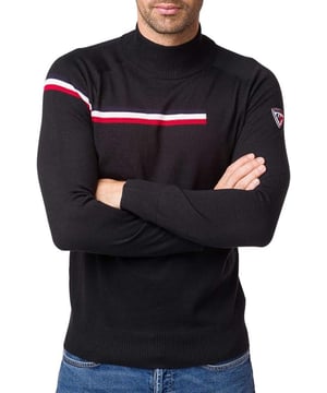 50% Virgin Wool 50% Acrylic. The timeless turtleneck sweater from the sport chic collection. A stand-up collar provides unparalleled warmth and comfort, this men's pullover is the companion for a day on the court or on the town. The iconic tricolor stripe that is cut in the three quarters of the jersey to symbolize the exit to the track pays homage to the story of the brand