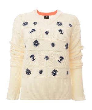 The Paul Smith Women's Knitted Jumper in cream is crafted from 100% wool, providing both warmth and a luxurious feel. Featuring a classic crew neckline and ribbed cuffs, this jumper is perfect for staying stylish and cozy during the colder months.