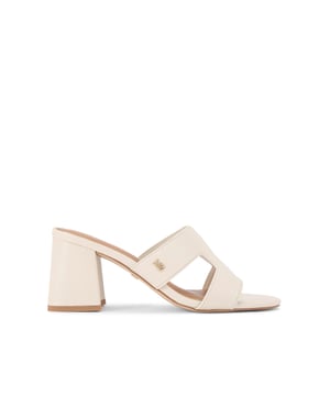 This KG Kurt Geiger Riri Heel features a bone upper with slight texture. There are cut outs in the strap and the heel is in a block style. Heel height: 5cm.