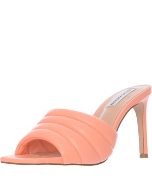 Upper: 100% Polyurethane, Lining: 100% Polyurethane, Sole: 100% Rubber. The Steve Madden Tempt heeled mules in peach are a stunning choice for anyone looking to add a touch of elegance and height to their outfit. With their sleek stiletto heel and easy slip-on design, these mules are not only stylish but also comfortable and versatile, making them perfect for both office wear and evening outings. The natural peach hue offers a subtle yet chic look that can complement a wide range of colors and styles in your wardrobe.