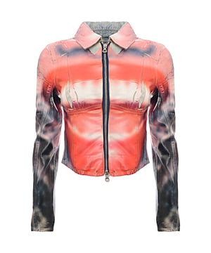 100% Lyocell. This cropped jacket features a classic collar, front two-way zip fastening and embossed detailing