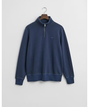 Made from 100% cotton in a loopback texture, this sweatshirt has been garment washed for a sunfaded, lived-in look. Designed for a regular fit, it features raglan sleeves, a half-zip collar, and logo embroidery at the chest. The soft ribbed cuffs and hem complete the design.

Regular fit
Half-zip collar
Ribbed hem and cuffs
GANT logo embroidered at chest

 100% Cotton 

2067036
 
 