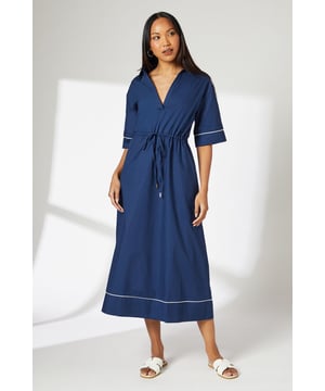 Collared V-neckline for a sophisticated touch
        Elbow-length sleeves with contrasting trim detail
        Drawstring waist for a customisable fit
        Midi length offering versatile styling options
        Contrasting piping along sleeves and hem for added interest
    
    This Principles poplin midi dress combines comfort and style for effortless daywear. The collared V-neckline and elbow-length sleeves create a polished look, while the drawstring waist allows for a personalised fit. The contrasting trim detail along the sleeves and hem adds a subtle yet eye-catching element. Perfect for casual outings, family gatherings, or weekend brunches, this dress can be styled with flat sandals and a woven tote for a relaxed look. For a more put-together ensemble, pair it with white trainers and a denim jacket. The versatile midi length makes it suitable for various occasions, from park picnics to casual office days. Made from breathable cotton, this dress ensures comfort throughout the day, making it an ideal choice for your warm-weather wardrobe.
