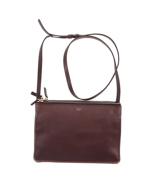 VINTAGE, RRP AS NEW
The Celine Large Trio Crossbody Bag in Burgundy Lamb Leather is a statement piece that combines luxury with functionality, featuring three separate compartments for easy organization. Crafted from soft lamb leather, it offers a smooth, rich texture and a timeless color that elevates any outfit. Style it with a monochrome ensemble to let the deep burgundy pop, or pair it with a leather jacket and boots for a chic, edgy look. Its versatile design and spacious interior make it perfect for both day-to-night transitions while maintaining a polished, sophisticated appearance.
Celine Large Trio Crossbody Bag in Burgundy Lamb Leather
Condition: Excellent
Signs of wear: No retail tag, No visible sign of wear., 
Packaging: Dust bag
Color: Burgundy
Material: Leather | lambskin leather
Size: One Size | One Size
SKU: 464681 / NAPPUGBBA461785W / NAPPUGBBA461785W 
Dimensions:  Length: 250 mm, Width: 30 mm, Height: 180 mm