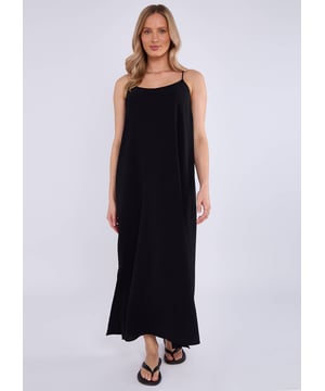 Mit unserem Black Strappy Cross Back Airflow Oversized Kleid können Sie Ihre Freizeitkleidung aufwerten. Dieses Kleid hat nicht nur ein schickes, überkreuztes Riemchen-Design, sondern bietet auch eine bequeme und luftige Passform. Perfekt für jede besondere Veranstaltung, werden Sie sich stilvoll und selbstbewusst in diesem Kleid fühlen.