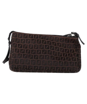 VINTAGE, RRP AS NEW
The Fendi Zucca FF Baguette Shoulder Bag in Brown Canvas is a bold and iconic accessory, featuring the signature FF monogram that gives it a timeless yet contemporary appeal. Crafted from durable canvas, this bag offers both style and functionality with its compact size and versatile shoulder strap. Pair it with a sleek black dress and heels for a sophisticated evening look, or wear it with jeans and a blazer for a chic, everyday ensemble. The warm brown tones of the canvas make it a versatile addition to any wardrobe, effortlessly complementing both casual and formal outfits.

 Fendi Zucca FF Baguette Shoulder Bag in Brown Canvas

Condition: Very good
Signs of wear: No retail tag, Minor sign of wear., Lightly used but very well maintained. Minor creasing, light worn corners, light scratches.
Packaging: Box
Color: Brown | ochre
Material: Canvas 
Size: One Size | One Size
Measurements: Width: 90; Height: 160; Length: 250; Handle drop: 200; Strap length: 470
SKU: NAPPUGBBA463283W