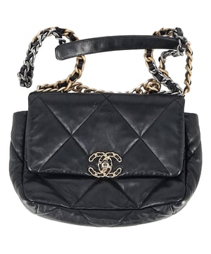 VINTAGE, RRP AS NEW
Indulge in timeless luxury with the Chanel Quilted Chanel 19 Large Flap Bag in black leather, a statement piece that effortlessly blends modern elegance with classic design. Crafted from puffy goatskin leather, this iconic bag features the signature chunky two-tone chain strap and the unmistakable chain entwined CC emblem closure, which exudes sophistication with a contemporary edge. The soft, quilted texture and spacious interior make it not only a stunning accessory but a practical one too.

This bag is perfect for the discerning fashionista who appreciates the rich heritage of Chanel while embracing innovative design. Whether you're heading to a glamorous event or elevating your everyday look, the Chanel 19 is the ideal companion to complete your outfit with an air of refined elegance.

Chanel Quilted Chanel 19 Large Flap Bag in Black Leather
Condition: very good
Signs of wear: No retail tag, No visible sign of wear., 
Packaging: None
Color: black
Material: Leather | leather
Size: One Size | One Size
Measurements: Width: 300; Height: 200; Length: 670; Handle drop: 460; Strap length: 1080
SKU: NAPPUGBBA462910W
