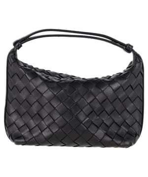VINTAGE, RRP AS NEW
The Bottega Veneta Wallace Shoulder Bag is a sophisticated piece that exudes the brand's signature craftsmanship. Made from luxurious black calfskin, the bag features the iconic Intrecciato weaving technique, adding a rich texture to its sleek design. The adjustable shoulder strap ensures a perfect fit, while the zippered closure secures your essentials in the spacious main compartment. With its minimalist design and timeless appeal, this bag effortlessly complements any wardrobe.


with Dust bag

Bottega Veneta Wallace Shoulder Bag in Black Leather
Condition: very good
Signs of wear: light marks on interior and exterior
Packaging: Dust bag
Color: black
Material: Leather | calfskin leather
Size: One Size | One Size
Measurements: Width: 270; Height: 170; Length: 250; Handle drop: 270; Strap length: 0
SKU: NAPPUGBBA462459W